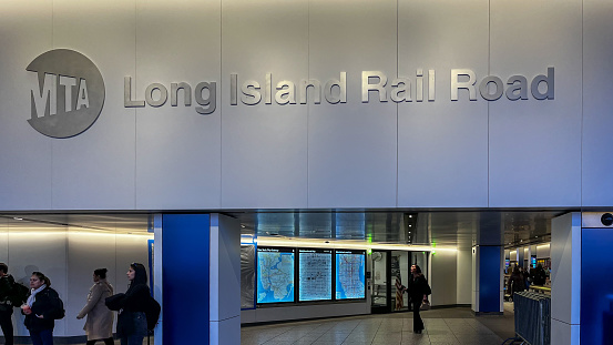 May 18 , 2023 - Chelsea, Manhattan, New York City, NY, USA:  Long Island Railroad and MTA logo and people at Penn Station in New York City