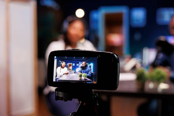 istock Digital camera filming a home talk show 1972812801