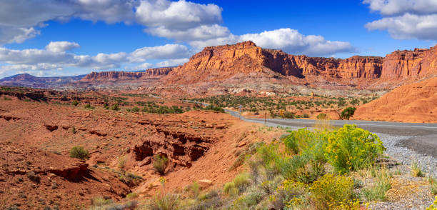 istock Road through Cliffs and Buttes in Capitol Reef National Park, Utah 1972821437
