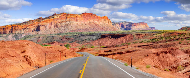 istock Road through Cliffs and Buttes in Capitol Reef National Park, Utah 1972823026