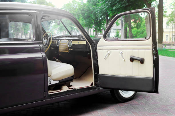 istock White interior. Car chairs and seats. Car sofa. Back and front row. Interior and door trim. Classic look. High quality 1972839427