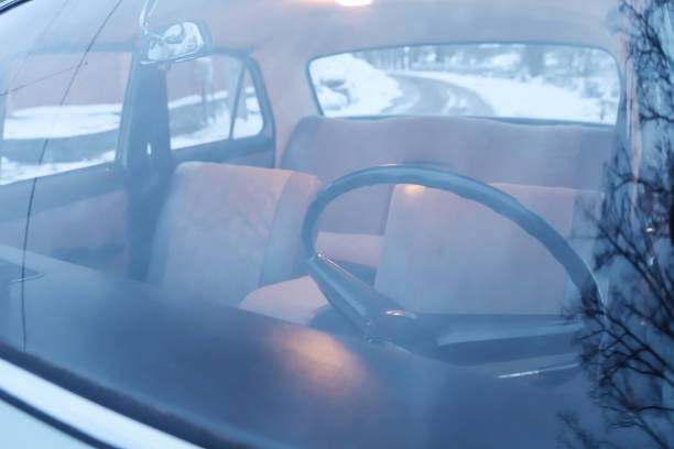 retro car interior. Vintage dashboards. Luxury leather steering wheel. Auto controls.