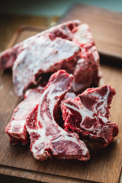 istock Beef spine on wooden board at market 1972845588