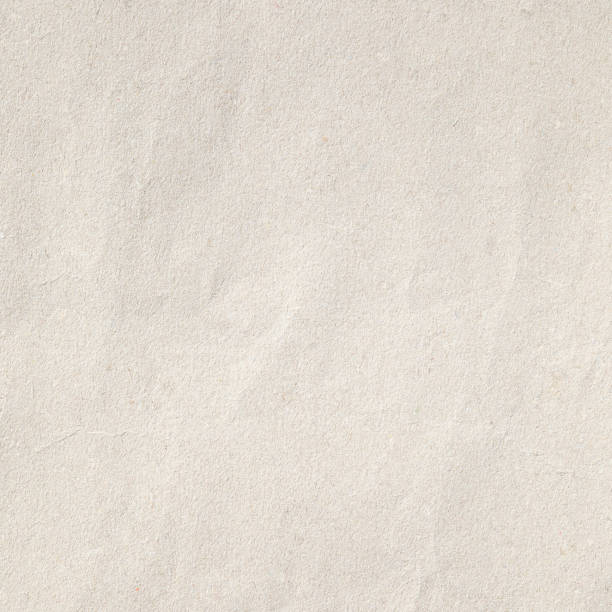 istock Brown crumpled paper texture with grains macro closeup 1972850137