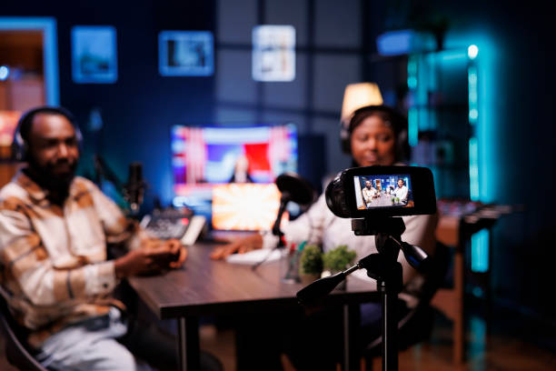 istock Bloggers recording story with camera 1972850685