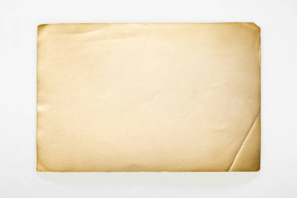 istock Vintage Paper Texture on a Plain White Background Illustrating Antiquity 1972852798