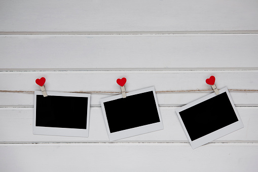 Polaroids on Clothesline