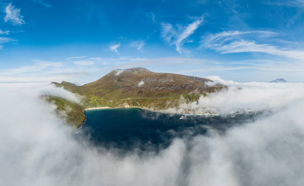 Keem Bay is a picturesque and secluded bay located on Achill Island in County Mayo, Ireland. It is known for its stunning natural beauty, with high cliffs surrounding a horseshoe-shaped beach. Keem Bay is a popular destination for visitors seeking tranquility and breathtaking views.