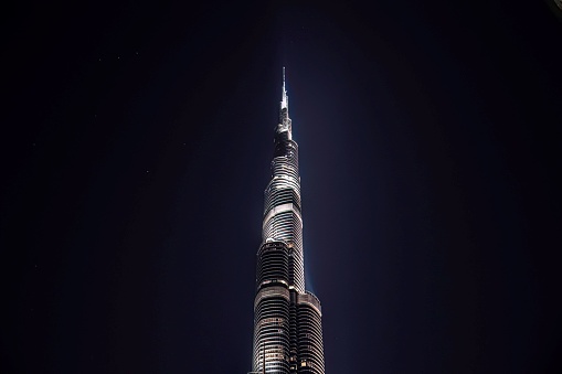 Dubai, United Arab Emirates 01 21 2024: The Burj Khalifa tower in the downtown district of Dubai at night