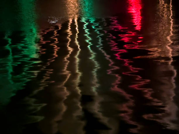 istock Coloured light fountain show on water 1972951098