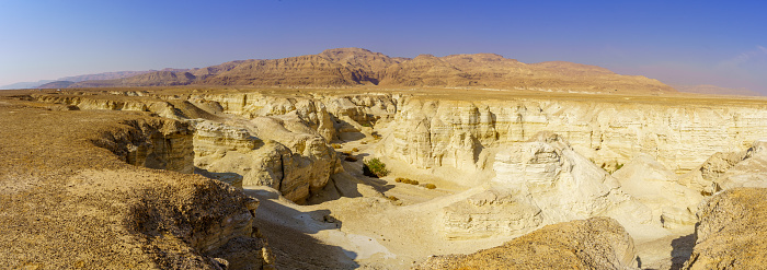 Panoramic view of the landscape of the desert Peratzim valley, canyon carved in lissan marl rocks. Dead Sea coast, Judaean Desert, southern Israel