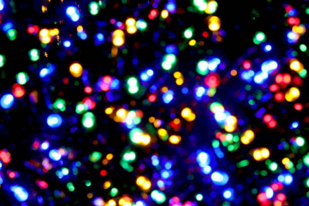 istock blurred background of many colored lights, ideal as a slightly hyptonic background 1973008830