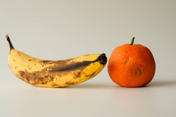 Spoiled mandarin. An overripe banana.