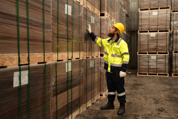 istock Caucasian businessman checking stock at warehouse 1973068654