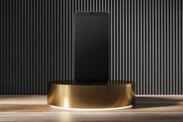 istock Empty decorative linear wall with blank smartphone on golden pedestal, wooden surface with shadows and mock up place. Presentation concept. 3D Rendering. 1973072203
