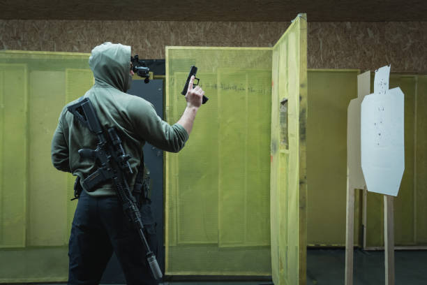 istock A man engages in tactical rifle and pistol shooting with nightvision at a shooting range. 1973127352