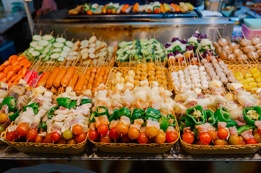 Different skewers on night market in southeast asia