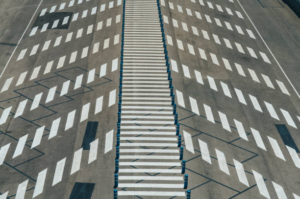 istock Wide empty parking lot with crosswalk 1973147144