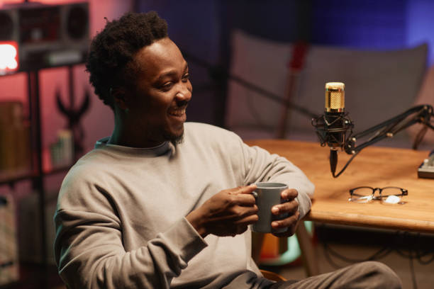 istock Happy Male Podcaster in Studio 1973173254