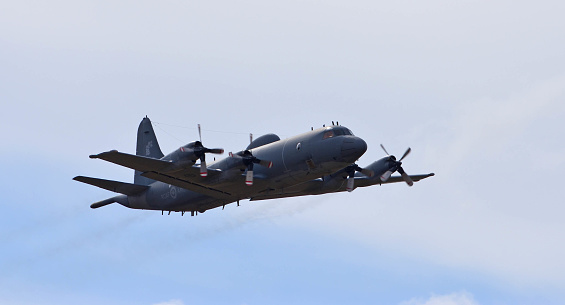 Little Gransden, Cambridgeshire, England - August 28, 2022: RCAF CP 140 Lockheed Aurora  maritime patrol aircraft operated by the Royal Canadian Air Force in flight.