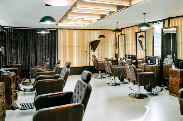 istock Stylish interior of modern barbershop 1973192498