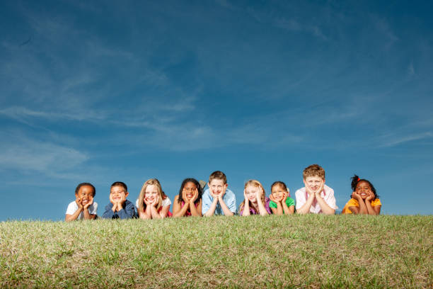group of cute asian kids having fun in the park