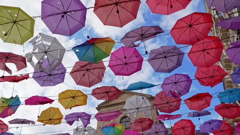 Colorful Umbrellas Hanging On The Street In Catania