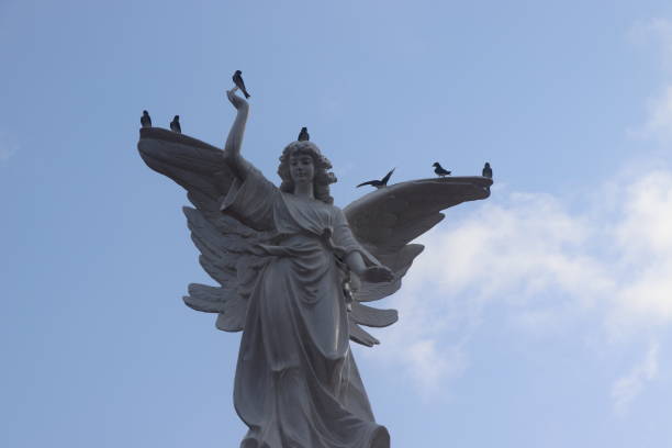 istock Angel coming from the sky. 1973305074