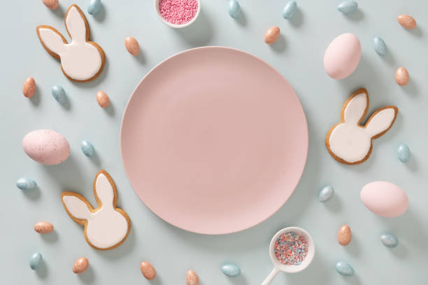istock Easter bunny cookies on blue background. Top view. 1973339456