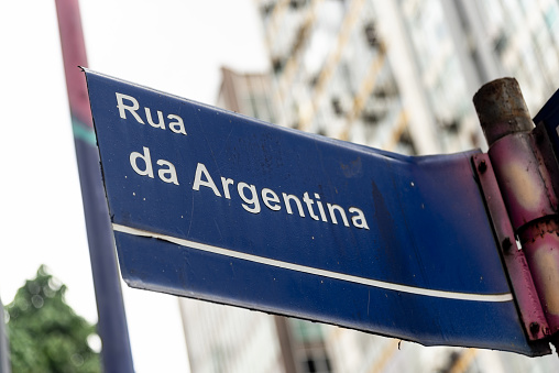 Salvador, Bahia, Brazil - January 05, 2024: Signpost indicating the name of Argentina street in the commercial district in the city of Salvador, Bahia.