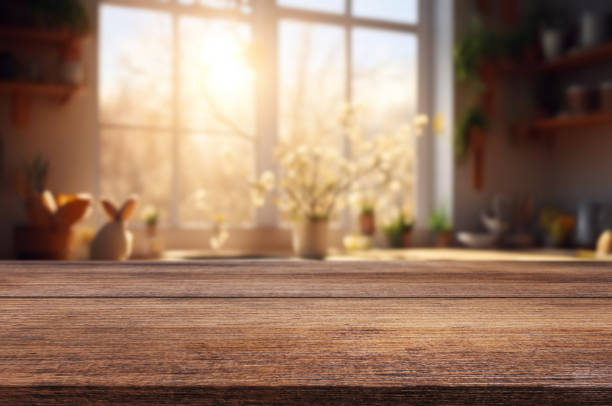 istock Table or surface on background of flowers and painted eggs. Easter concept. 1973376044