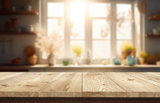 istock Table or surface on background of flowers and painted eggs. Easter concept. 1973376554