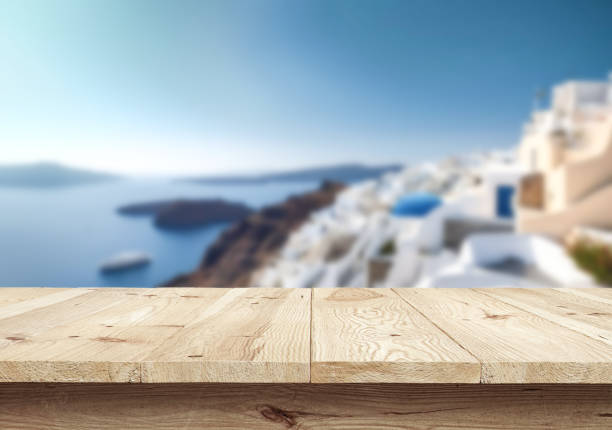 istock Table or surface with tropical swimming pool or beach in the background 1973388152