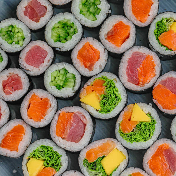 istock Tray of Assorted Sushi Rolls With Various Toppings 1973413477