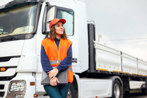 istock Blue Collar Female Worker, Truck and Logistics, Warehouse Manager, Checklist, Cargo Transportation, Shipping 1973416079