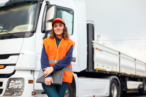 Blue Collar Female Worker, Truck and Logistics, Warehouse Manager, ChecklistBlue Collar Female Worker, Truck and Logistics, Warehouse Manager, Checklist, Cargo Transportation, Shipping