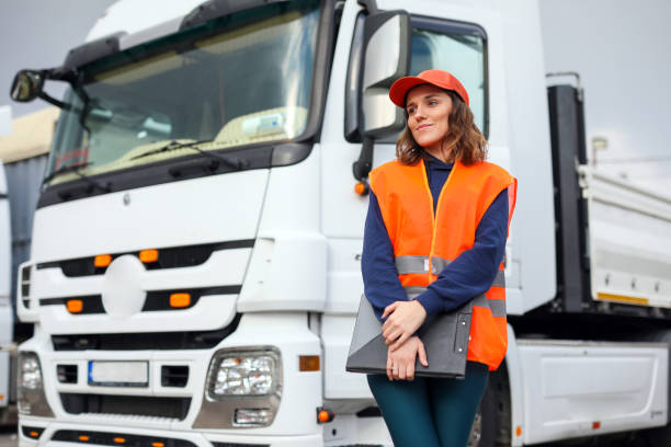 istock Blue Collar Female Worker, Truck and Logistics, Warehouse Manager, Checklist, Cargo Transportation, Shipping 1973417643