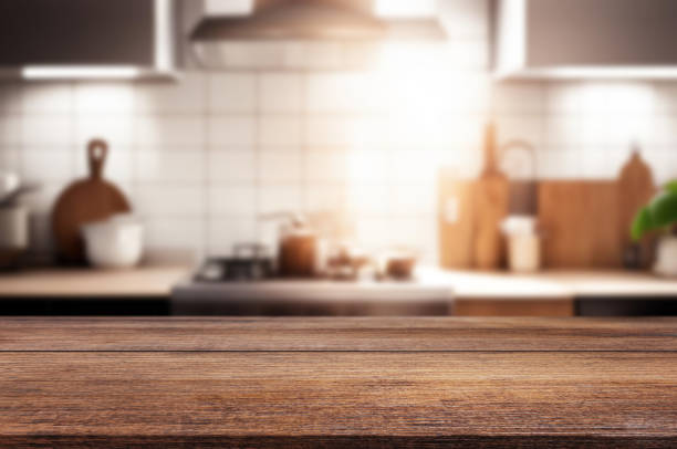 istock Wooden table or surface on the background of a beautiful kitchen 1973423391