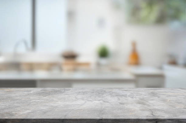 istock Wooden table or surface on the background of a beautiful kitchen 1973439493