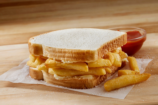 Chip Butty Sandwich with Butter and Ketchup on White Bread