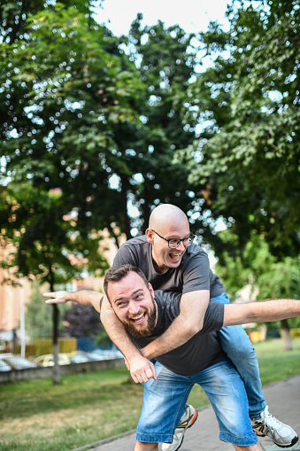 Gay Male Carrying Boyfriend On Back While He's Dealing With Cancer