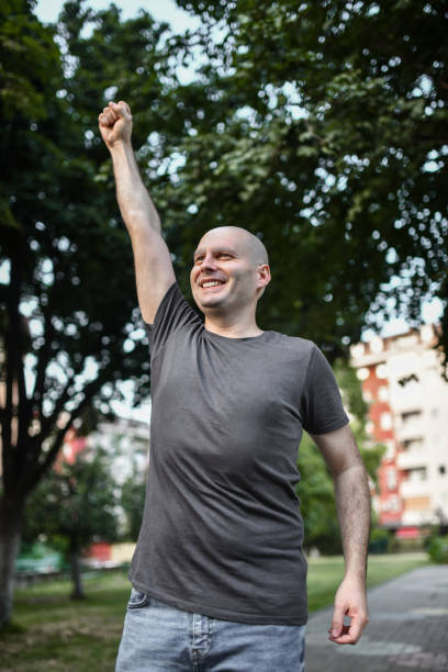 istock Balding Male Feeling Happy After Beating Cancer 1973480883