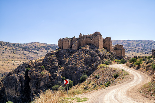 Photo of ancient roman castle on top of hill in Kahramanmaras province, Turkey. The castle is believed to be built by Armenians during Roman Empire period. It is called Maravuz Kalesi and Hurman Kalesi by locals. Shot with a full frame mirrorless camera.