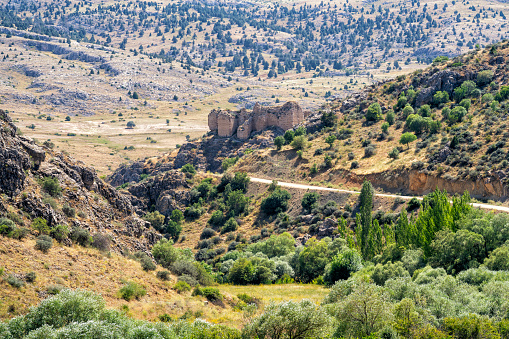 Photo of ancient roman castle on top of hill in Kahramanmaras province, Turkey. The castle is believed to be built by Armenians during Roman Empire period. It is called Maravuz Kalesi and Hurman Kalesi by locals. Shot with a full frame mirrorless camera.