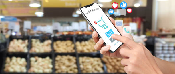 istock Hand holding new smartphone . Smartphone 1973655293