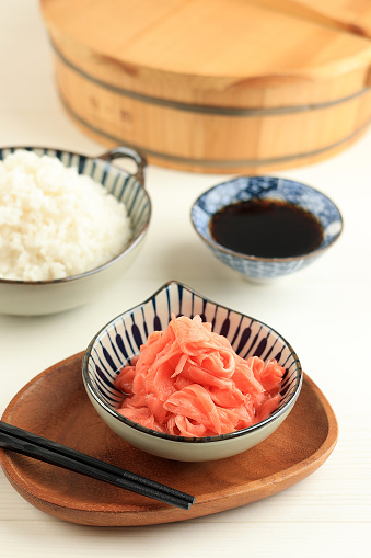 Japanese Pink Pickle Ginger or Sushi Gari in Japanese Mini Side Dish Bowl, on White Table