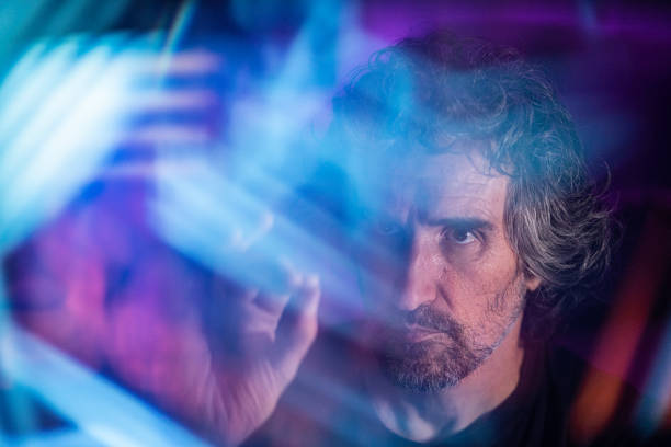 Futuristic tech portrait of mature man in virtual space. Vibrant, optimistic with a human touch.