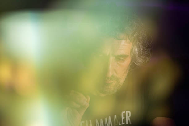 Futuristic tech portrait of mature man in virtual space. Vibrant, optimistic with a human touch.