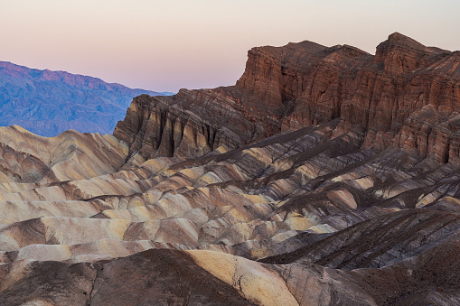 Zabriskie Point in Death Valley National Park in California at dawn.