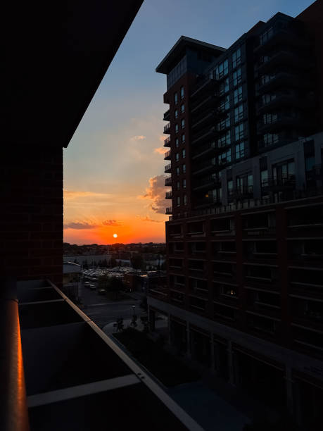 Sunset on a balcony of a modern apartment building in the city